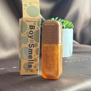 Boy smells chestnut cheeks